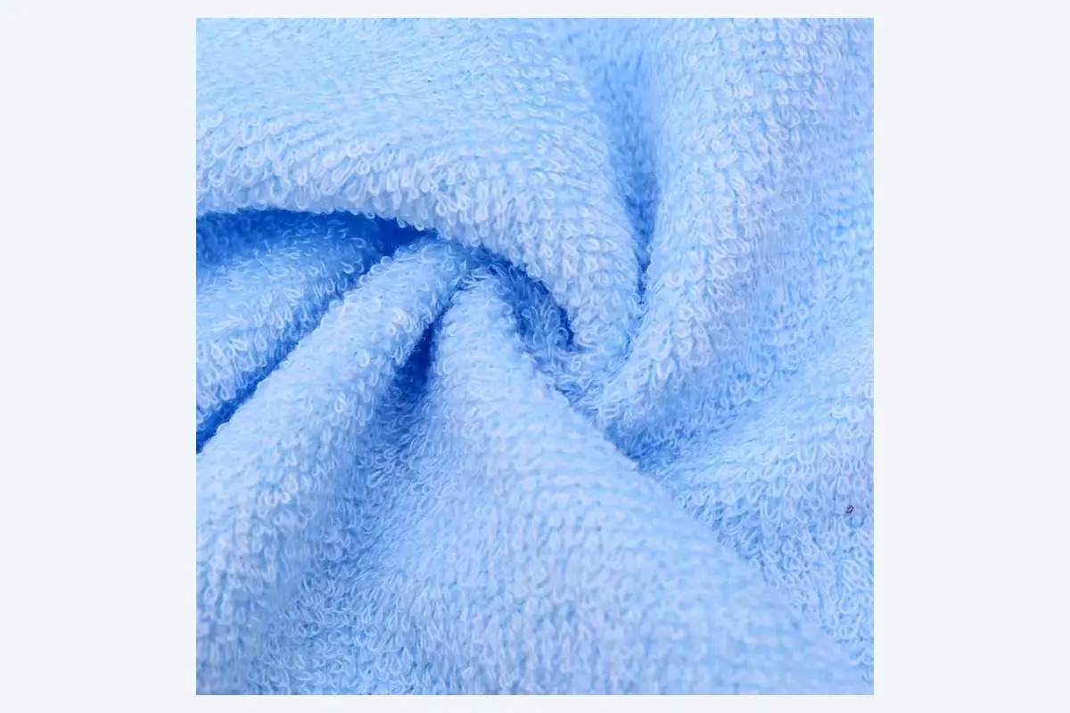 Close view of a looped cotton terry face towel surface