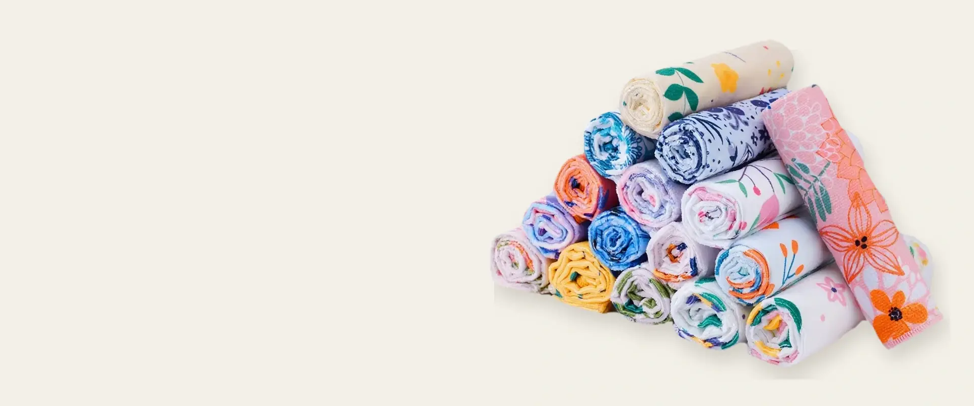 Colorful custom printed kitchen towels arranged in a product collection