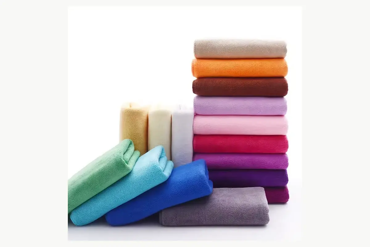 Microfiber towels arranged in a range of colors for task and product identification