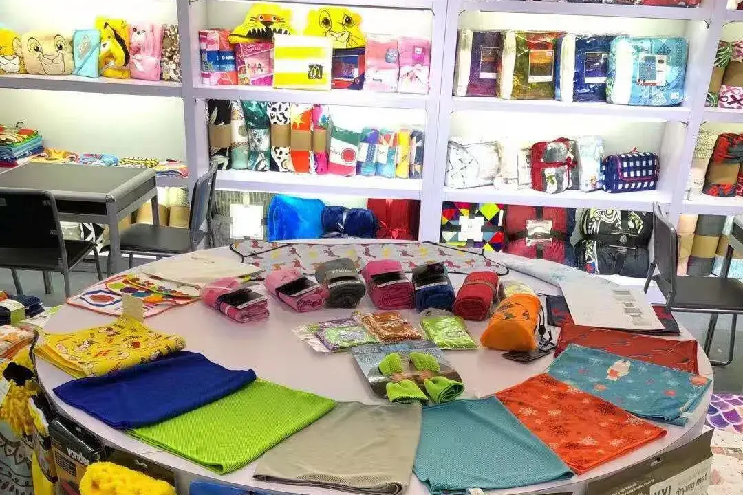 Custom towel samples in different colors, materials, patterns, and packaging formats