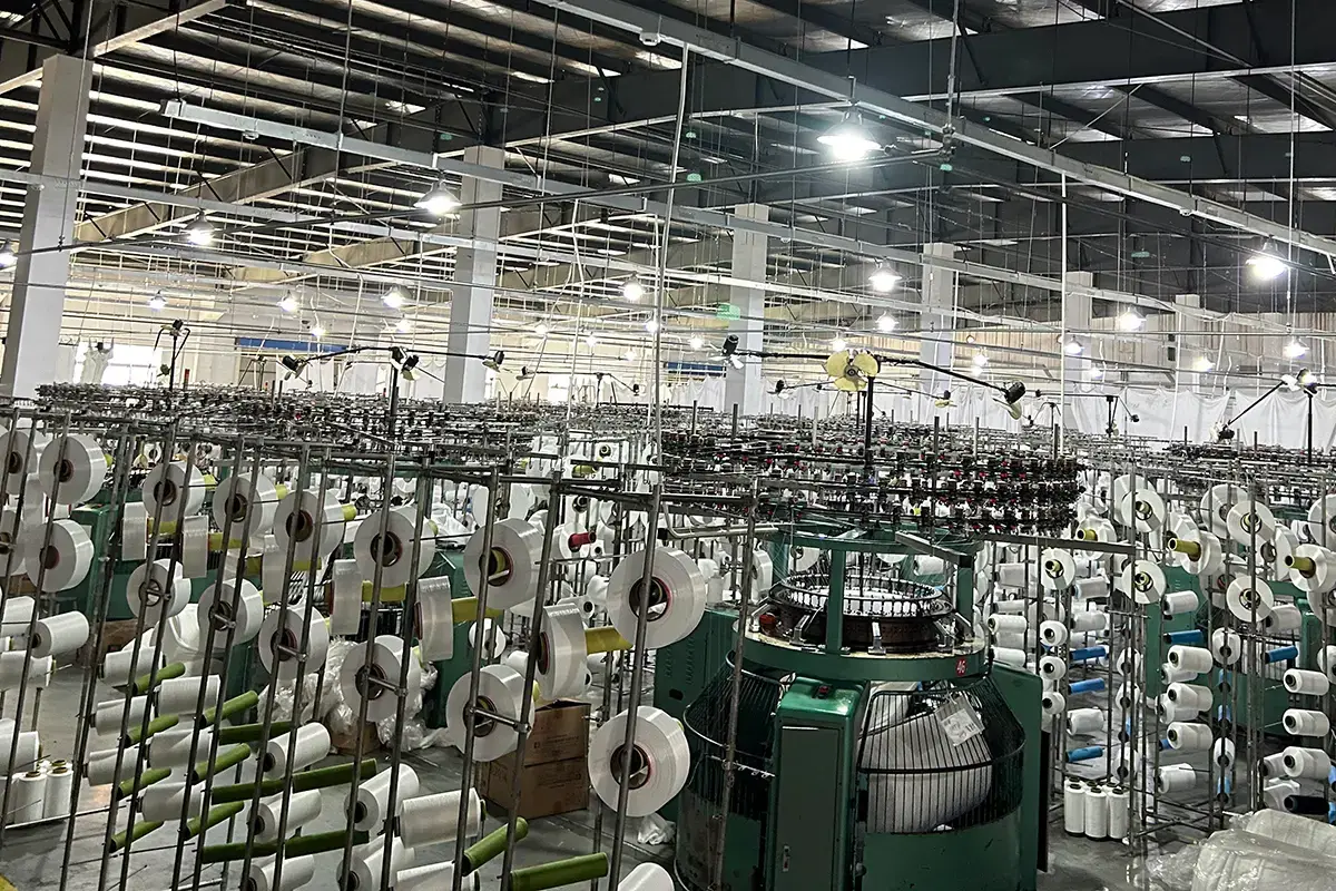 Rows of weaving machines used for different woven towel constructions