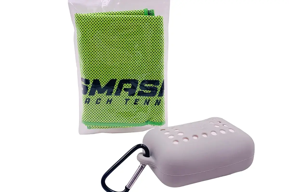 Folded sports towel fitted beside its protective carrying case