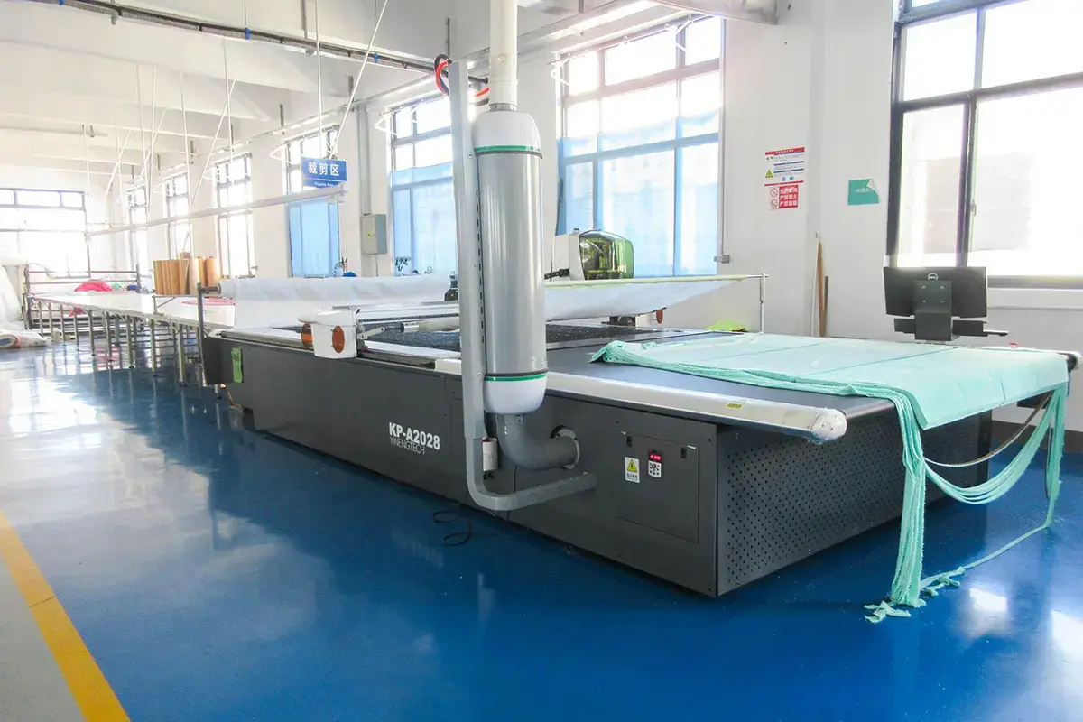 Towel panel positioned on a flatbed textile machine for print area and crop setup